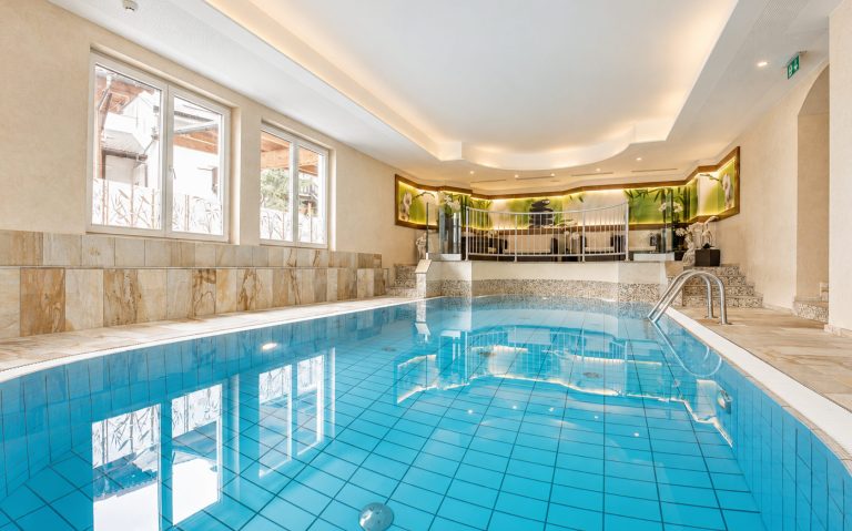 Indoor pool with windows along its whole length